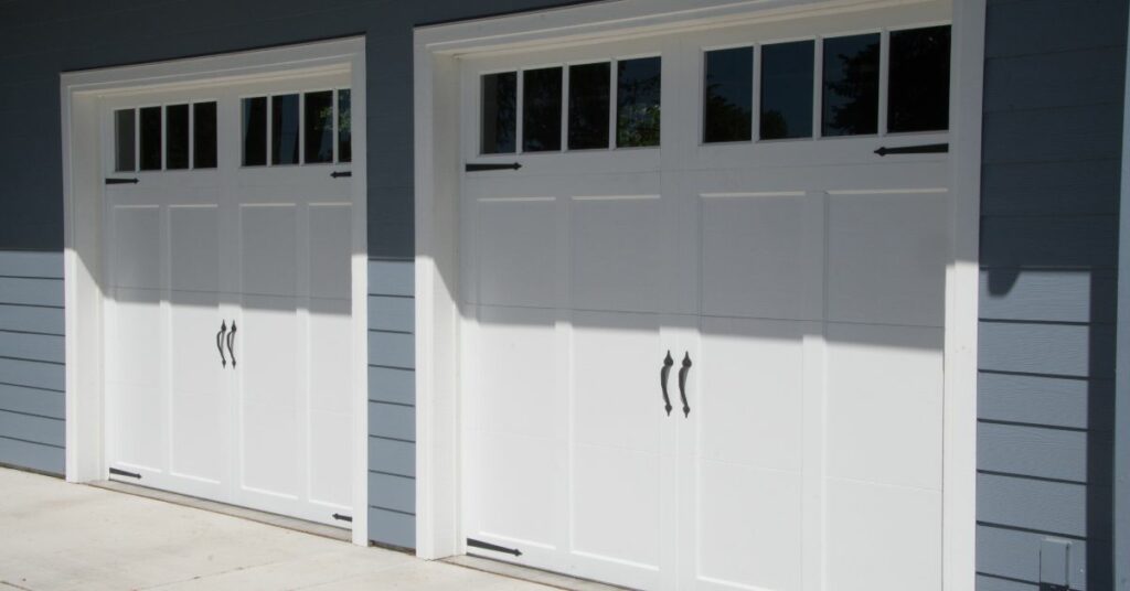white garage doors in Utah in gray backwall.