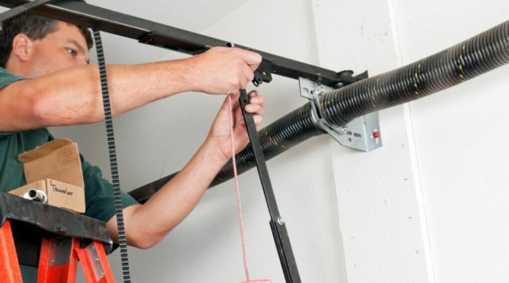 an image showing a garage door services expert fixing a broken spring